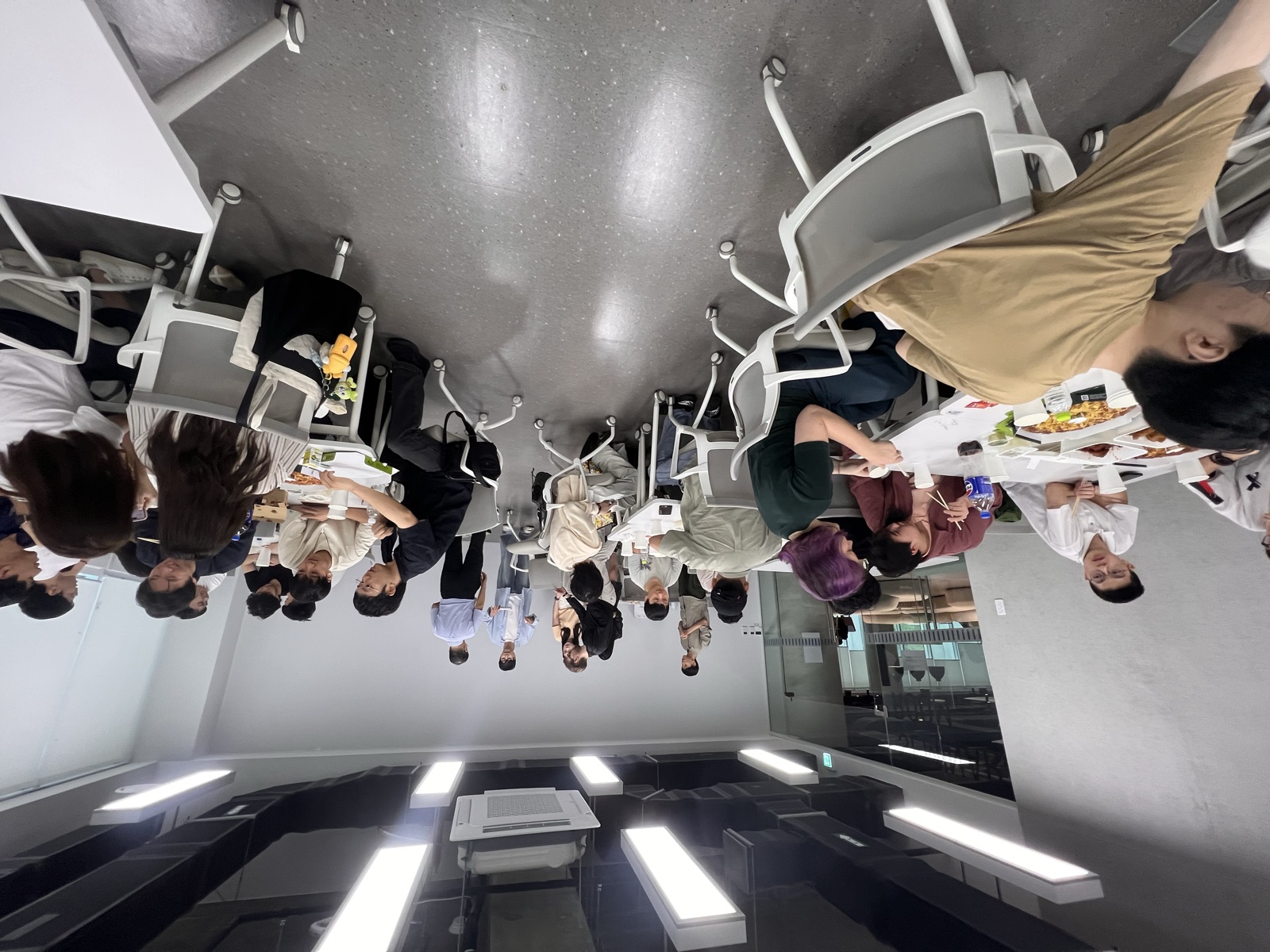 The room full of CityU and KAIST students sharing dinner
