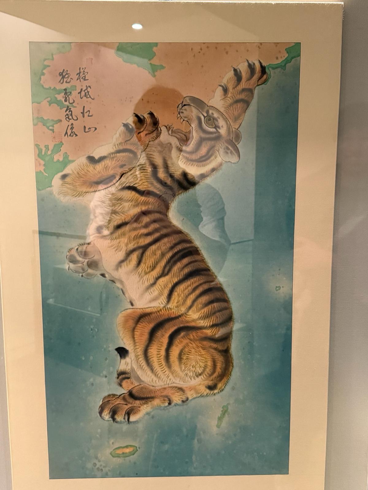A traditional painting of a tiger, Korea University's emblem