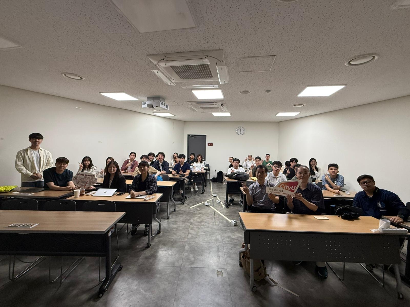 The group listening to the research introduction