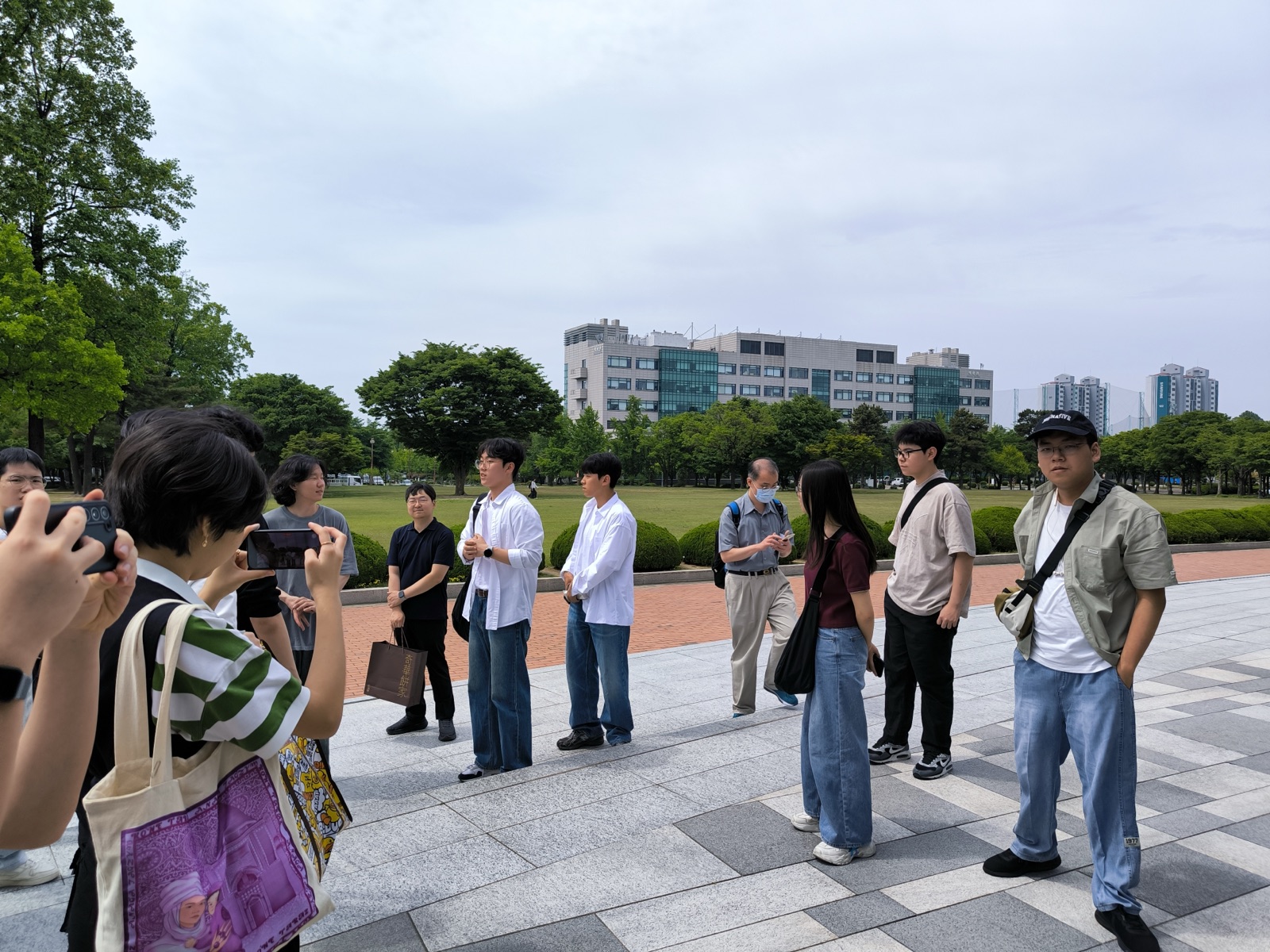 Out on the wide plaza beside the central lawn