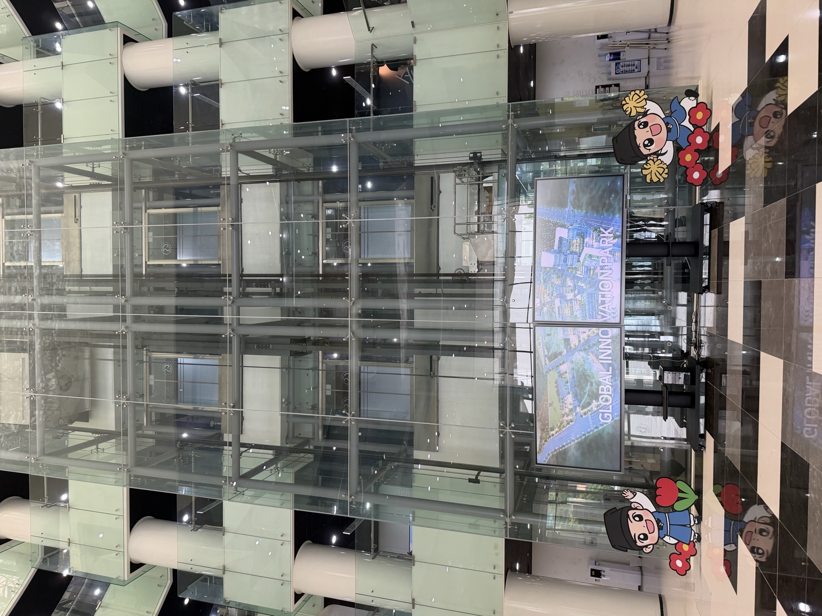 The soaring Global Innovation Park atrium with its glass elevator