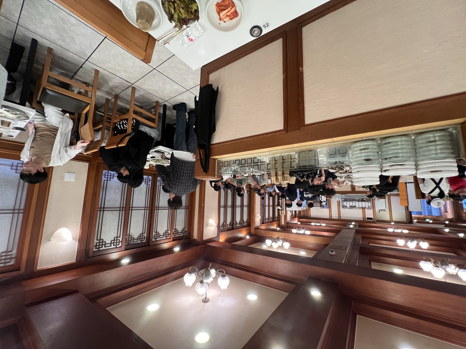 The warm wood-panelled restaurant interior