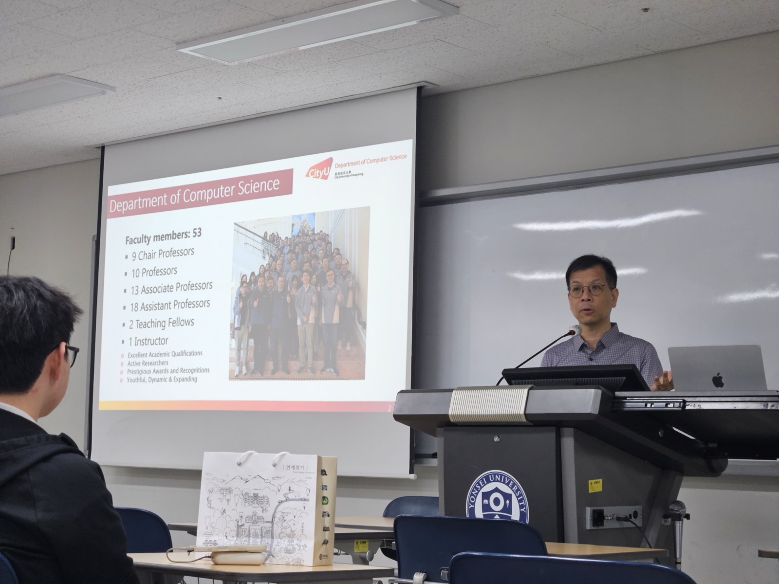 A Department of Computer Science slide with CityU faculty info