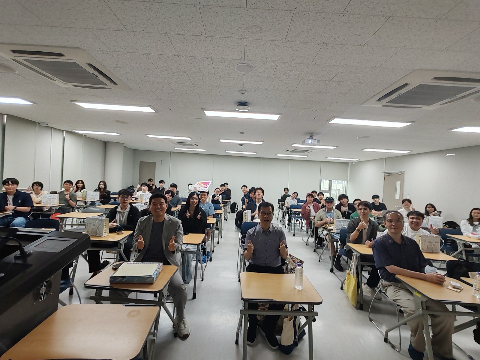 The combined CityU and Yonsei audience filling the seminar room